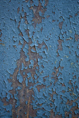Pale blue frayed paint texture background