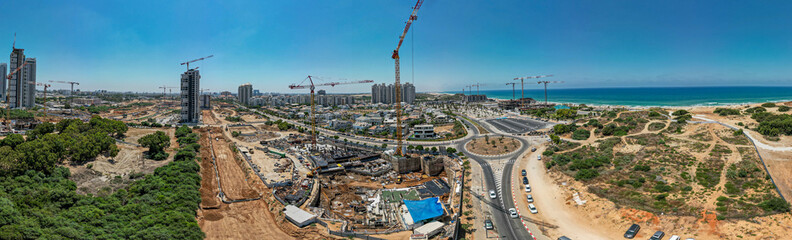Obraz premium Aerial panorama of a construction site on the beach of the city of Bat Yam- Israel