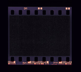 single 35mm film snip with empty or blank frame window on black, film scan.