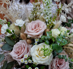 Bridal Bouquet . Closeup of a bride holding a bouquet of flowers