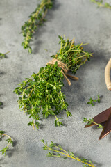 Fototapeta na wymiar Raw Green Organic Thyme Herb