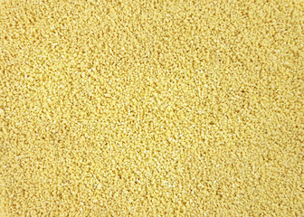 Yellow Soy lecithin granules top view. dietary supplements. Healthy nutrition concept. Soy Bean Lecithin with Plastic Spoon close up.