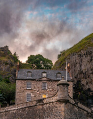 vertical view of Dumbarton Castle and Dumbarton Rock on the Clyde River at sunset