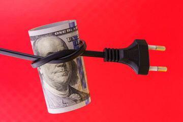 The president on a dollar bill with his eyes blindfolded with an electric cord. The concept of the...