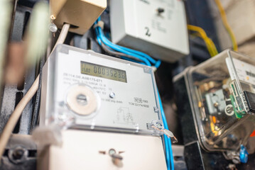 Two smart electric power meter counter measuring power usage.Close-up of modern smart grid...