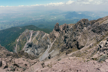 volcano malinche chasm, rocks and blue sky