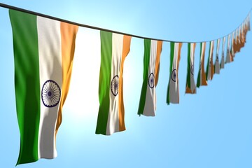 cute any holiday flag 3d illustration. - many India flags or banners hangs diagonal on rope on blue sky background with selective focus
