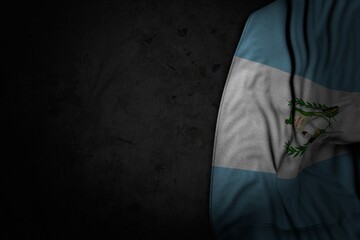 nice dark image of Guatemala flag with large folds on black stone with free place for content - any feast flag 3d illustration..