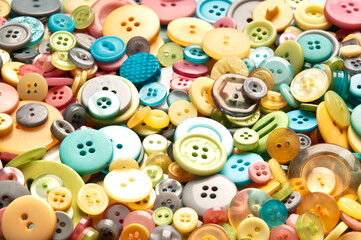 Fototapeta na wymiar background pattern of pastel colors buttons of various size