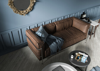 Skórzana kanapa na tle błękitnej ściany