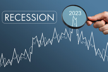 Economic crisis, Businessman using mobile smartphone analyzing sales data and economic graph chart that is falling, stock market crash caused.