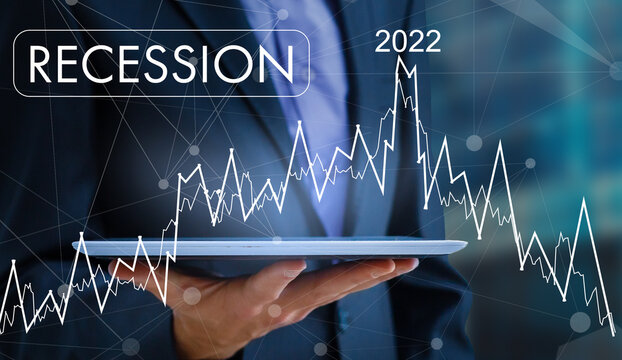 Economic crisis, Businessman using mobile smartphone analyzing sales data and economic graph chart that is falling, stock market crash caused.