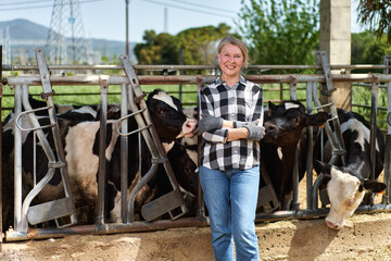 portrait of farmer woman at cow farm