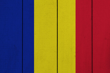Patriotic wooden plank background in colors of flag. Chad