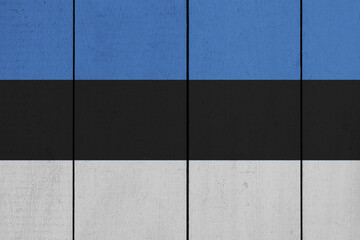 Patriotic wooden plank background in colors of flag. Estonia