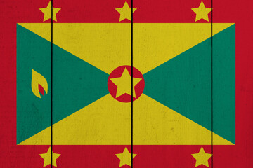 Patriotic wooden plank background in colors of flag. Grenada