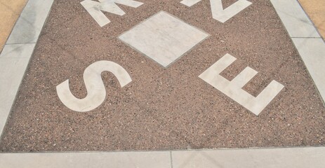 Compass Design on a Sidewalk