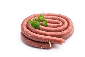 Raw thin lamb sausages isolated on white background
