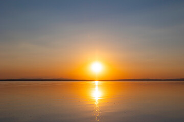 Fototapeta premium Sunset or sunrise background photo. Sunset over the lake