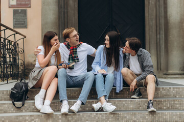 Fototapeta premium A group of students are talking on the street