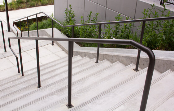 Stairway With Steel Banister To Apartment Complex From Top Of Stair Way 2