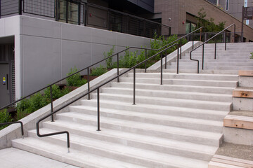 Stairway with steel banister to apartment complex from bottom of stairway  1