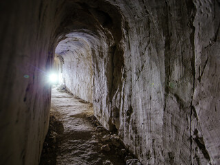 Dark creepy abandoned underground chalky cave temple