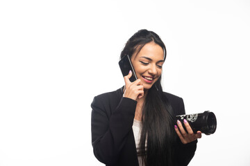 Business woman talking on cellphone on white background