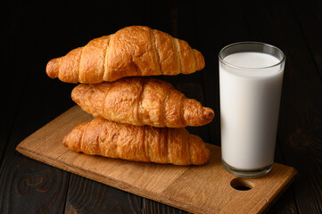Fresh croissants with milk