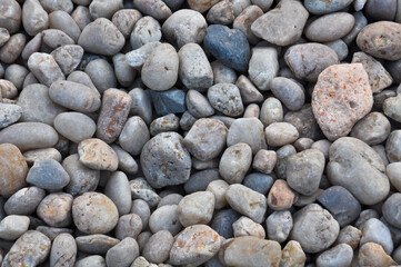 Background of gray-blue pebbles of various shapes in Kolkata, India