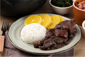 Delicious feijoada plate. Selective focus.