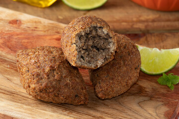 Focus on delicious Arabian snack kibbeh.