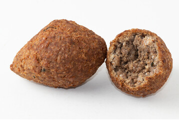 Kibbeh isolated on white background.