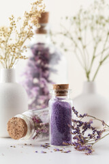 Obraz na płótnie Canvas Dried herbal flowers with bottle. Homeopathy background.