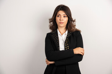 Portrait of confident employee posing on white background