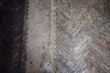 The texture of the old deregulated floor and cement in dark tones