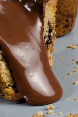 Chocolate syrup on a gray background