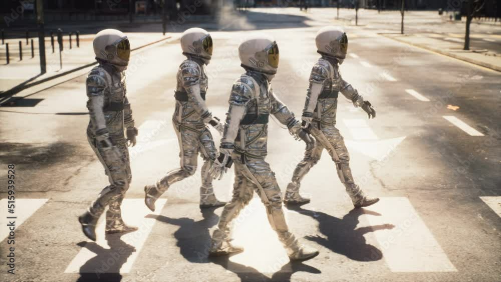 Canvas Prints a group of astronauts cross the road at a crosswalk in a metropolis. the astronauts are walking in a