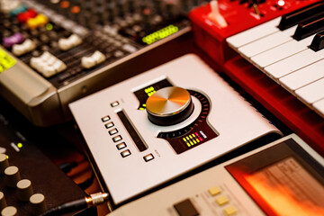 The surface with sliders of a sound mixer controller