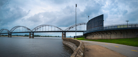 Panoramic landscaper of Centennial Bridge over the Mississippi River and the curved bike trails and...