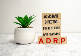 adrp word on wooden block and white background
