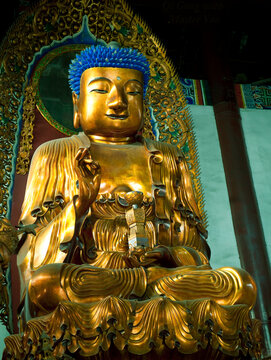 New Age Buddhism.  Photographic interpretation of ancient Buddhist statue in light of Internet depictions.