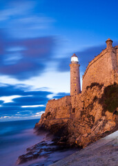 Lighthouse on the coast of the sea