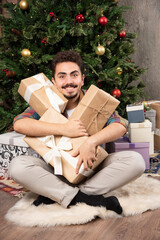 Fototapeta premium Christmas morning opening all gifts