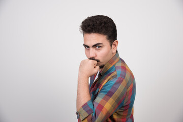 Fototapeta premium Happy handsome man squizing his fist
