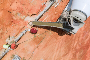 Aerial view showing concrete columns being poured in a new building an construction site