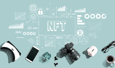 NFT theme with electronic gadgets and office supplies - flat lay