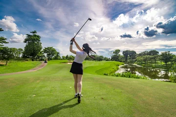 Poster Professional woman golfer teeing golf in golf tournament competition at golf course for winner © APstudio