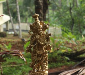 Lord krishna brass idol in golden color