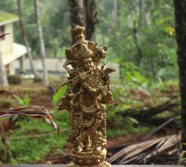 Lord krishna brass idol in golden color